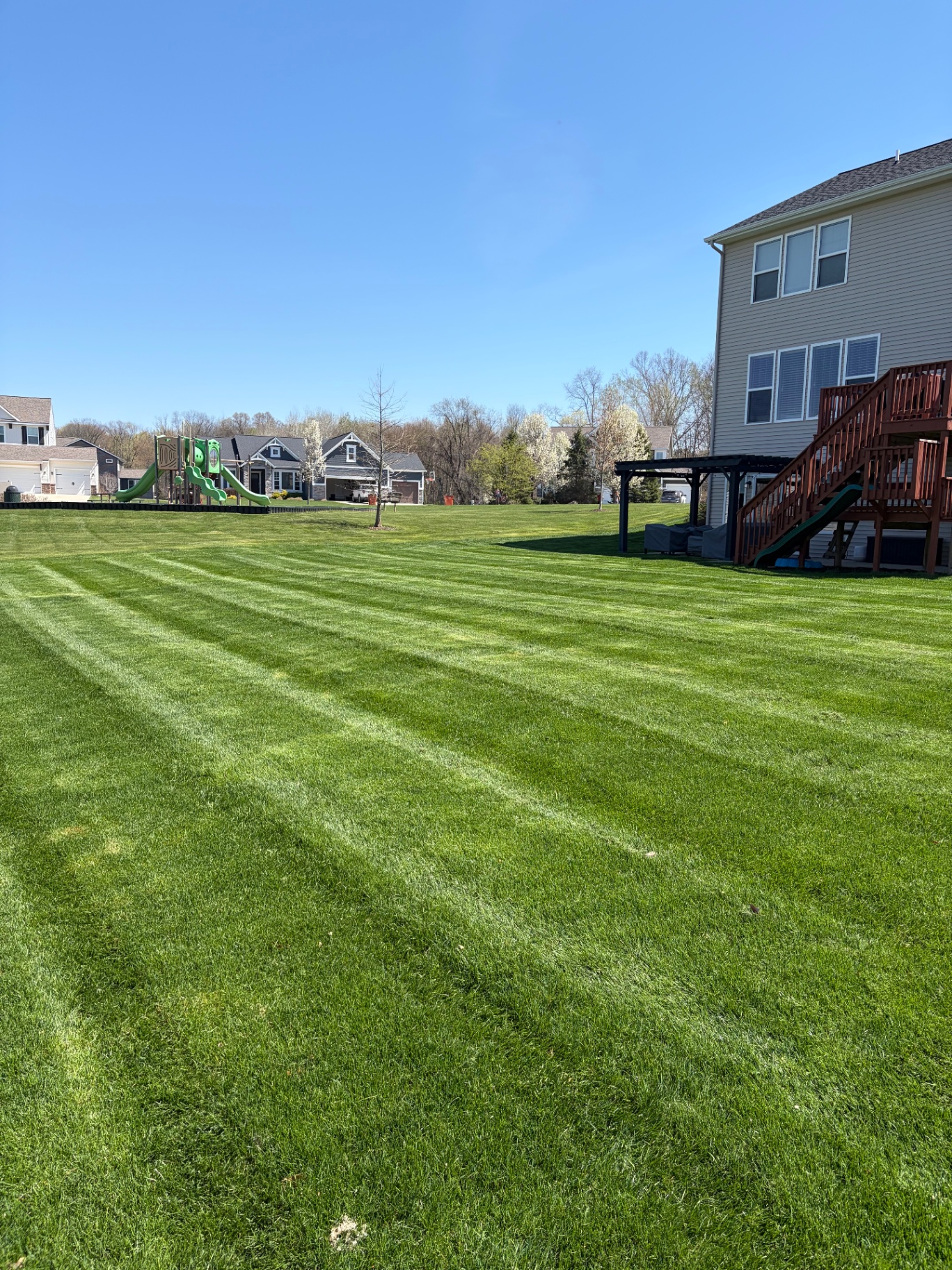 Wide striped lawn at a residential property